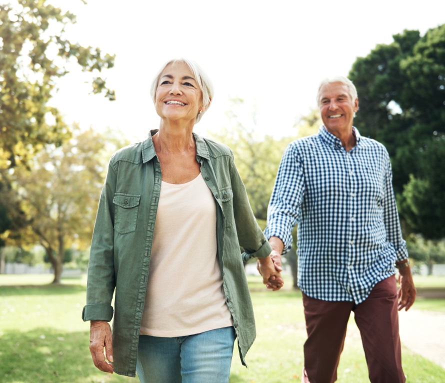 Couple holding hands on walk